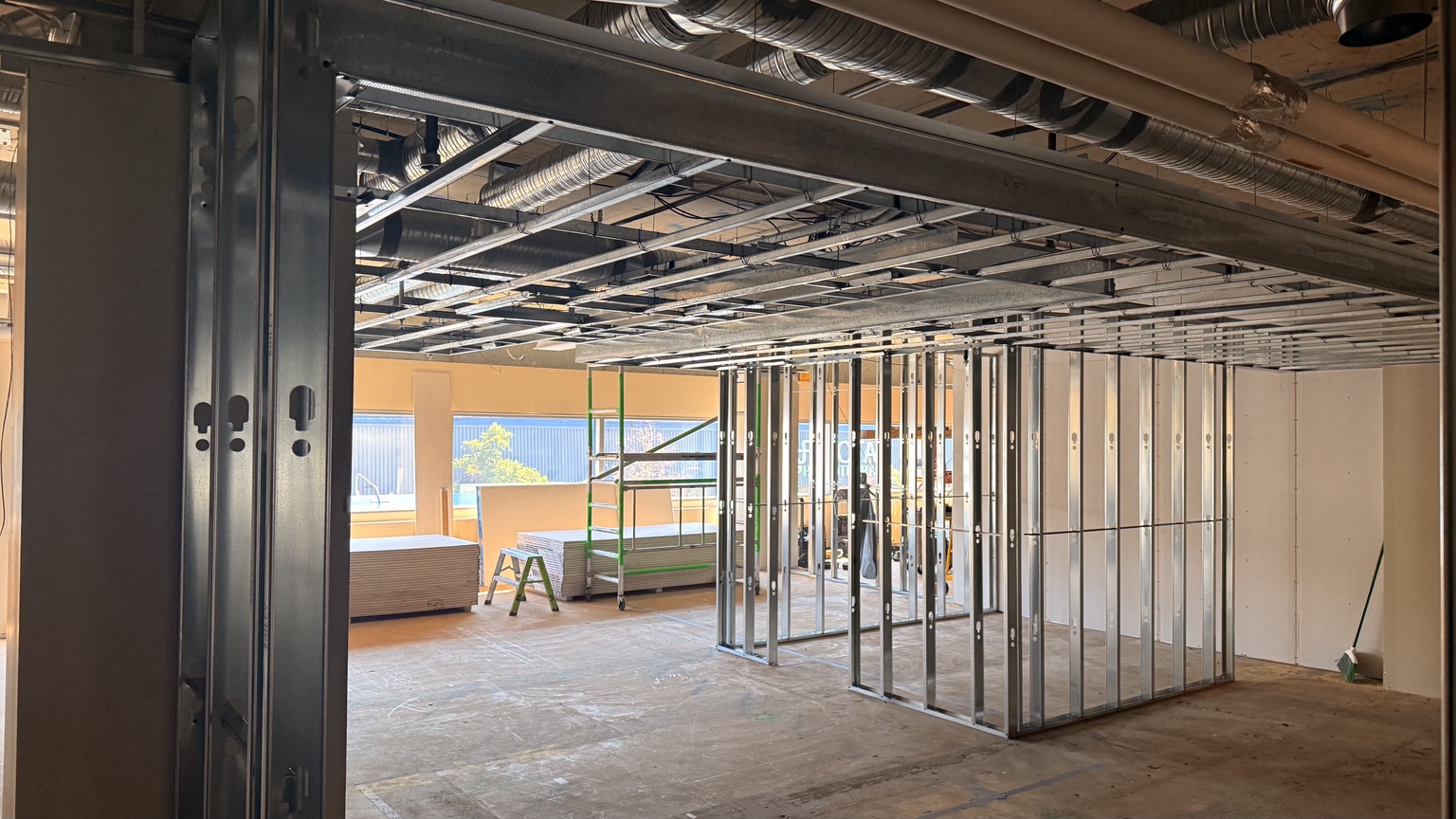 Commercial interior steel stud framing and ceiling work in progress